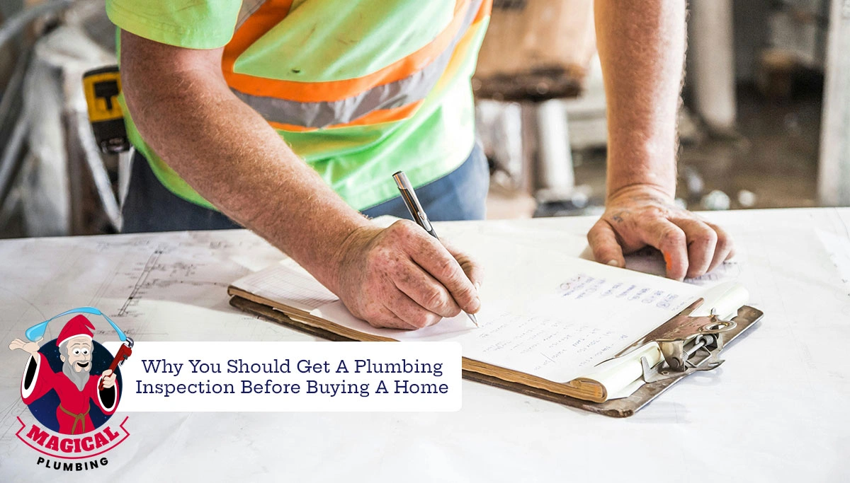 man in vest writes on a clipboard