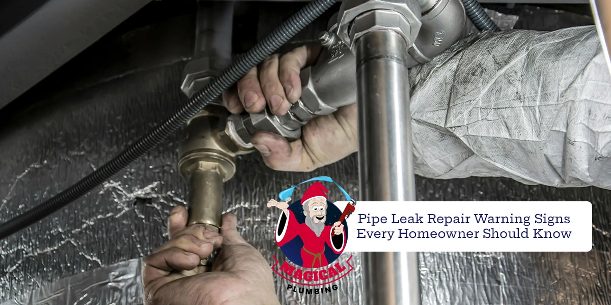 plumber repairing a pipe